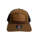Brown BF&S Richardson 112 hat with Blakely Feed & Seed leather patch on a white background